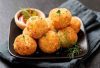 Crispy golden potato balls stuffed with creamy Awafi cheese from Al Manfoush, crunchy on the outside and melty on the inside.